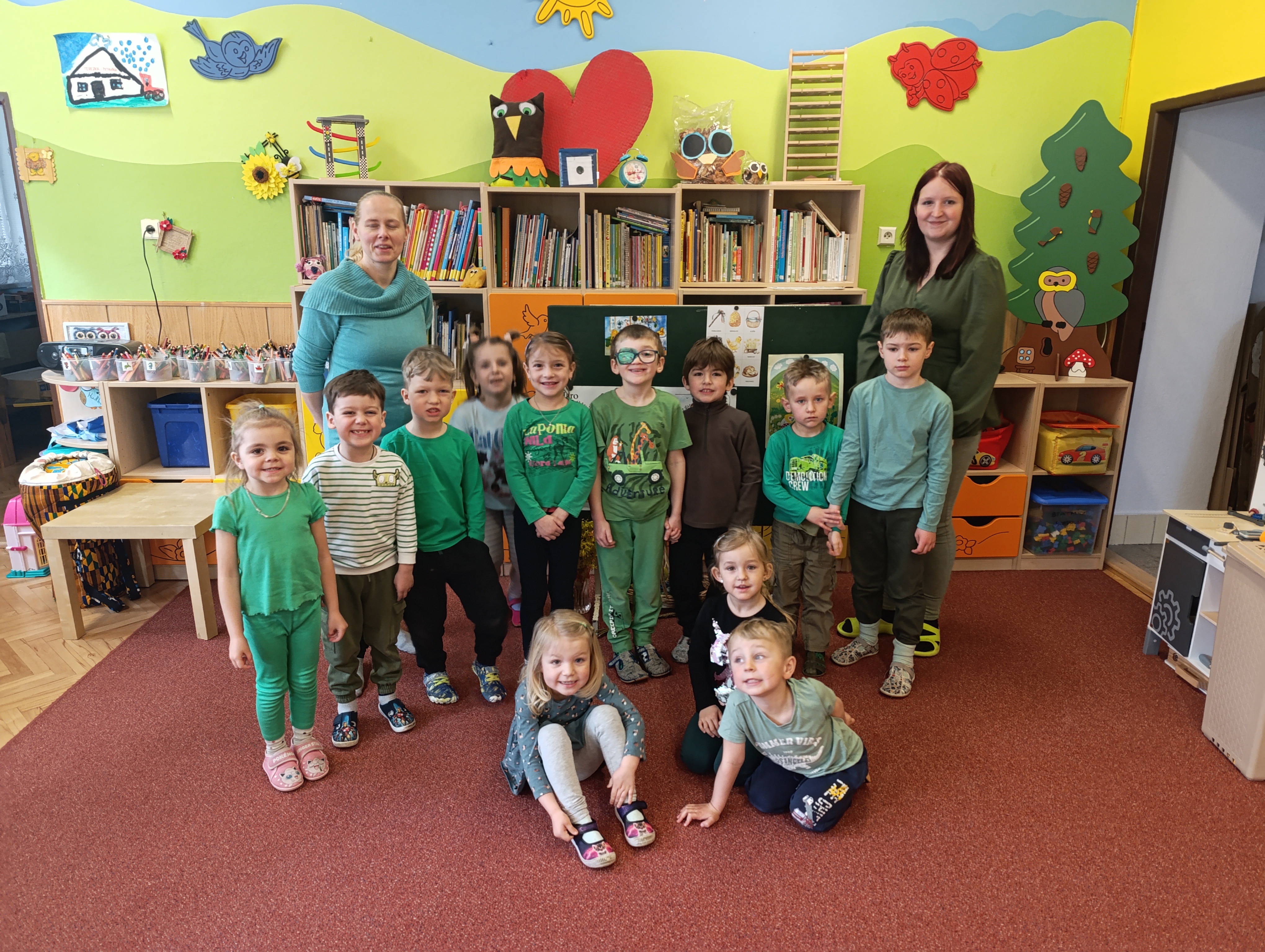 Zelená na tričku, úsměv na líčku